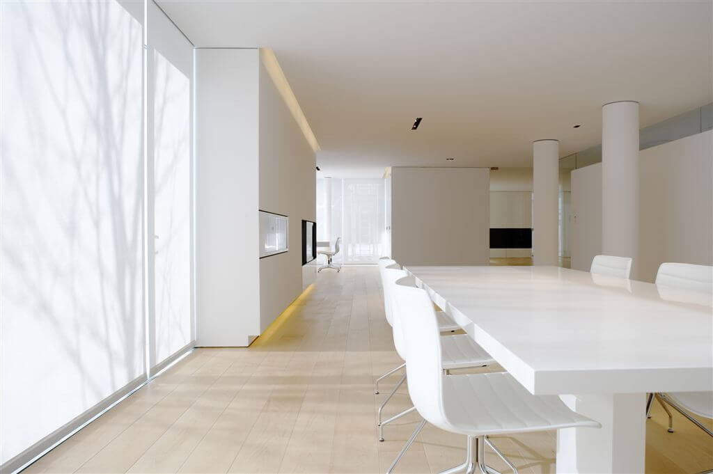 View down length of dining area with living room in background. View down length of dining area with living room in background.