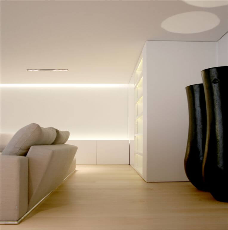 Second view of same room, highlighting built-in shelf space and large art pieces. Second view of same room, highlighting built-in shelf space and large art pieces.