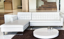 Sleek white modern sectional with chaise lounge