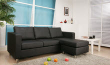 Black chaise lounge style sectional sofa