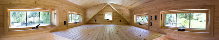 Wide angle view of the loft space in the Tinier home. Wide angle view of the loft space in the Tinier home.