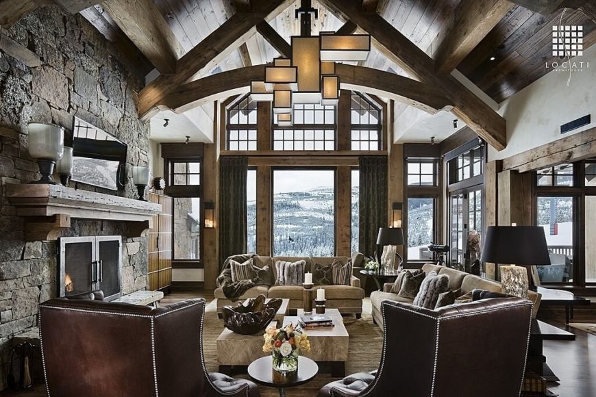 This is a great example of layered lighting. Sunlight pours through the enormous windows, lighting the room during the day, while a large chandelier brightens the space as the sun begins to fade. Lamps and candles can be used for softer mood lighting as the night wears on. This is a great example of layered lighting. Sunlight pours through the enormous windows, lighting the room during the day, while a large chandelier brightens the space as the sun begins to fade. Lamps and candles can be used for softer mood lighting as the night wears on.