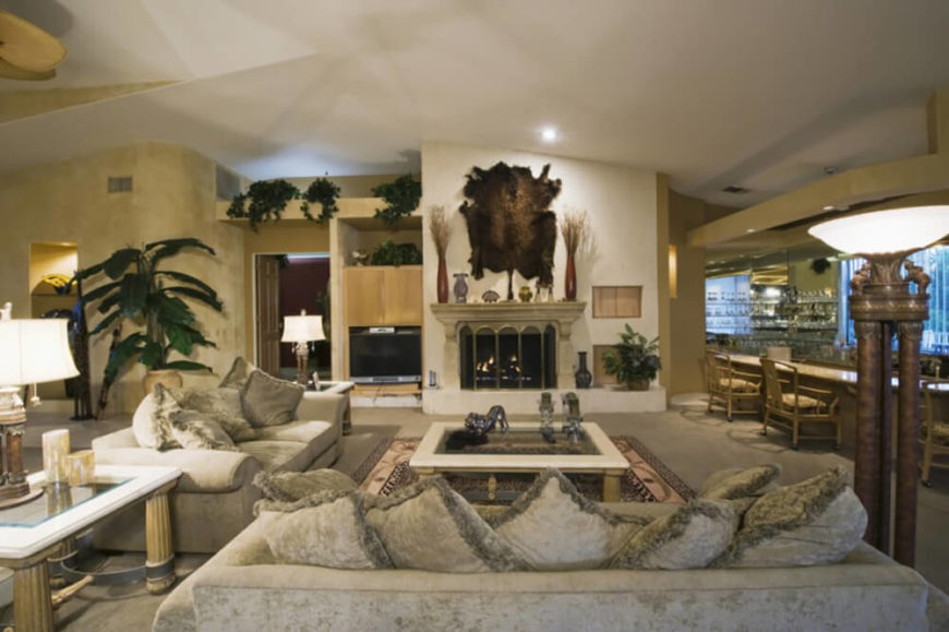 Animal hides are another way to decorate the walls, but they should be used sparingly, as to not overwhelm the room. Animal hides are another way to decorate the walls, but they should be used sparingly, as to not overwhelm the room.