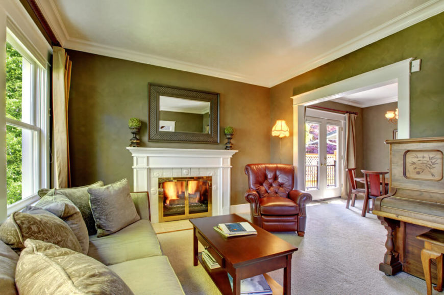 This earthy green color is a great example of using color in a living room. A darker color will work great in a room that gets a lot of natural light, but should be avoided in small, dark living rooms. This earthy green color is a great example of using color in a living room. A darker color will work great in a room that gets a lot of natural light, but should be avoided in small, dark living rooms.
