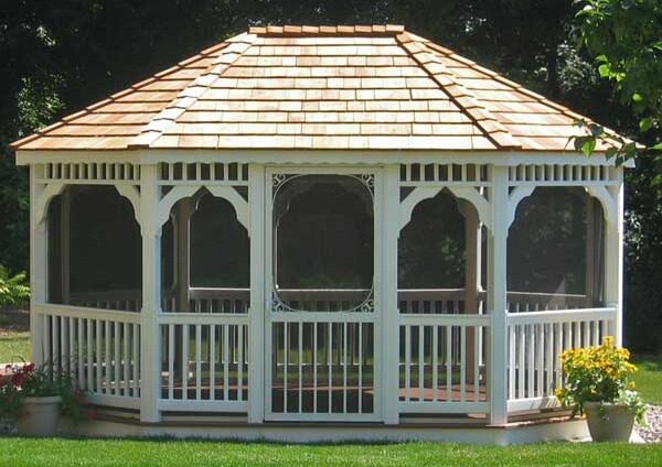 Another classic oval gazebo, this time in vinyl. The spaces are screened in to keep bugs out. Another classic oval gazebo, this time in vinyl. The spaces are screened in to keep bugs out.