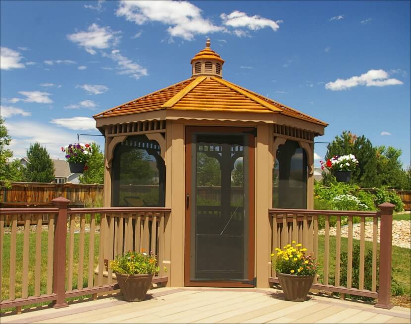 This screened gazebo is built off the corner of the main deck and patio area and is the perfect spot to escape into once the bugs start coming out. This screened gazebo is built off the corner of the main deck and patio area and is the perfect spot to escape into once the bugs start coming out.
