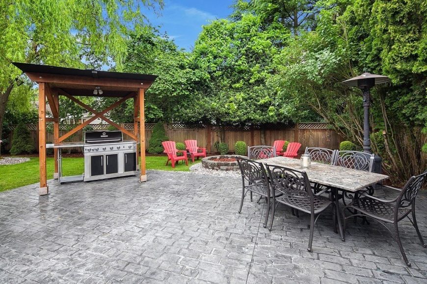 74z-gazebo-grill A simple wooden gazebo that acts as a rain and snow shelter for a large stainless steel barbecue grill. 74z-gazebo-grill A simple wooden gazebo that acts as a rain and snow shelter for a large stainless steel barbecue grill.