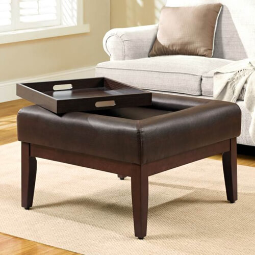 Brown leather ottoman coffee table. Brown leather ottoman coffee table.