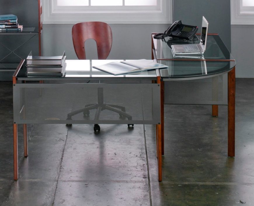 Glass surfaces add a boldly modern touch to any desk. Paired with wood or metal construction, the glass expands visual space and lightens the entire piece of furniture. Often removable for cleaning, maintenance, or moving purposes, glass desktops can be found in a variety of shapes and configurations. Glass surfaces add a boldly modern touch to any desk. Paired with wood or metal construction, the glass expands visual space and lightens the entire piece of furniture. Often removable for cleaning, maintenance, or moving purposes, glass desktops can be found in a variety of shapes and configurations.