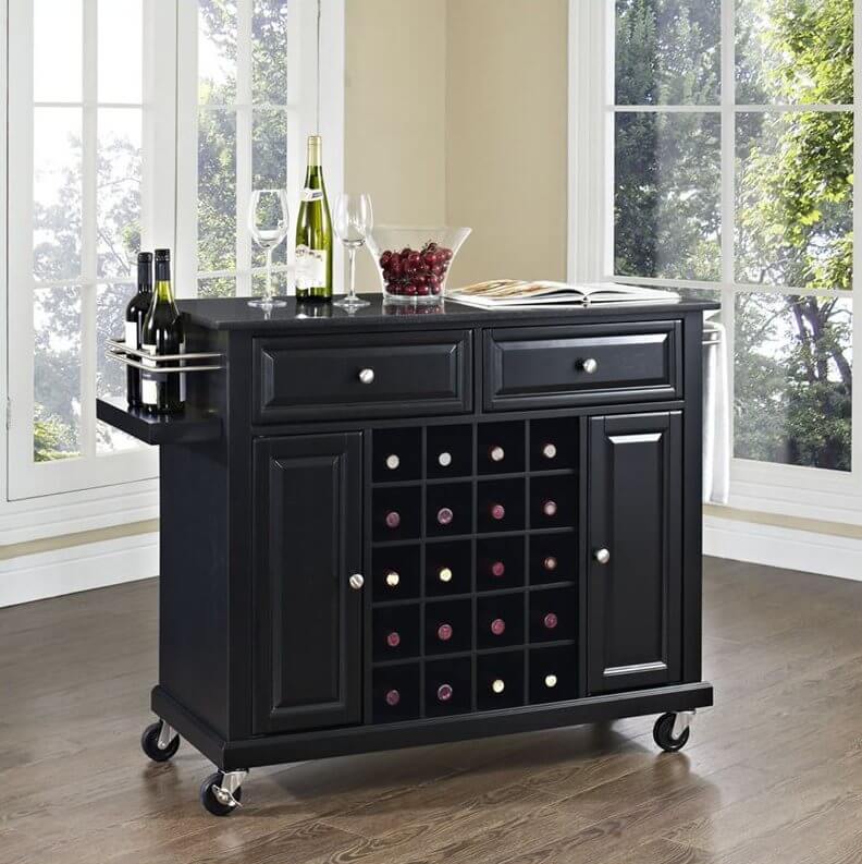 The first example in dark stained wood features a large rack and surface area, with cabinets and drawers for storage. The first example in dark stained wood features a large rack and surface area, with cabinets and drawers for storage.