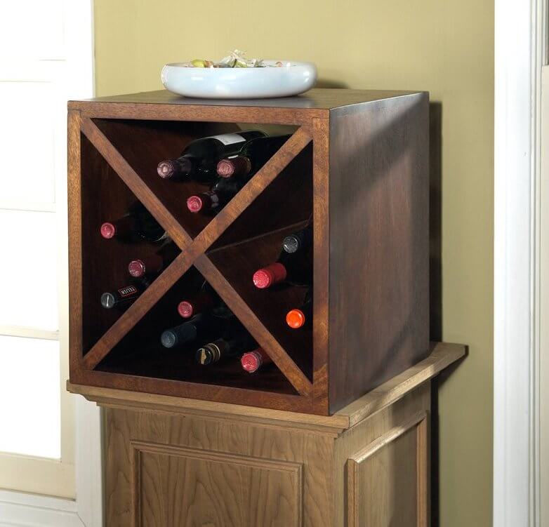 The cube design is exactly as it sounds: a cubic frame with interior racks for holding bottles. These can be easily purchased and set up in multiples, for extensive storage. The cube design is exactly as it sounds: a cubic frame with interior racks for holding bottles. These can be easily purchased and set up in multiples, for extensive storage.