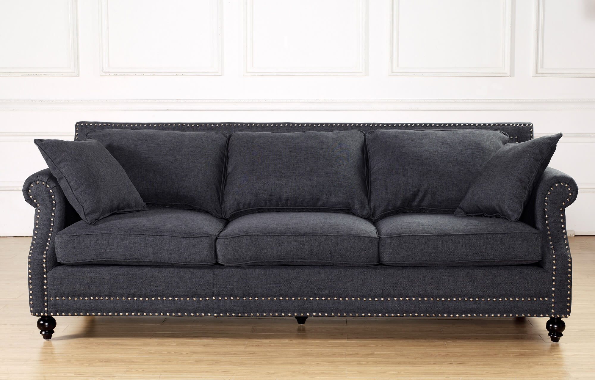This very contemporary sofa in a deep charcoal linen is detailed with a copper nail trim. The birch frame and legs are painted black to keep with a contemporary style. The high backrest and reposition-able cushions make this sofa an ultra-comfortable and plush option with a ton of style. This very contemporary sofa in a deep charcoal linen is detailed with a copper nail trim. The birch frame and legs are painted black to keep with a contemporary style. The high backrest and reposition-able cushions make this sofa an ultra-comfortable and plush option with a ton of style.