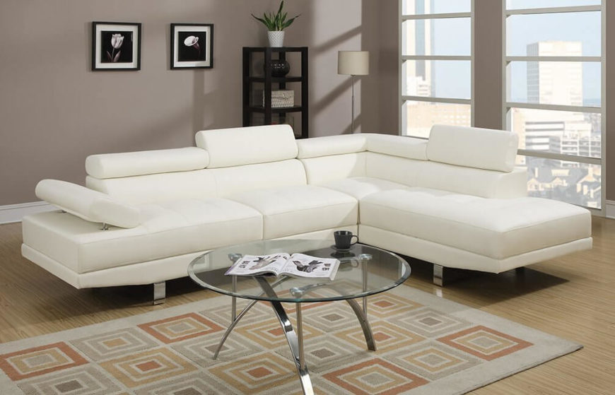 This futuristic two-piece faux leather sectional sofa is made out of soft touch faux leather and features adjustable armrests and back supports for an ultra-comfortable couch-potato experience. This sofa also features an elongated chaise lounge. This futuristic two-piece faux leather sectional sofa is made out of soft touch faux leather and features adjustable armrests and back supports for an ultra-comfortable couch-potato experience. This sofa also features an elongated chaise lounge.