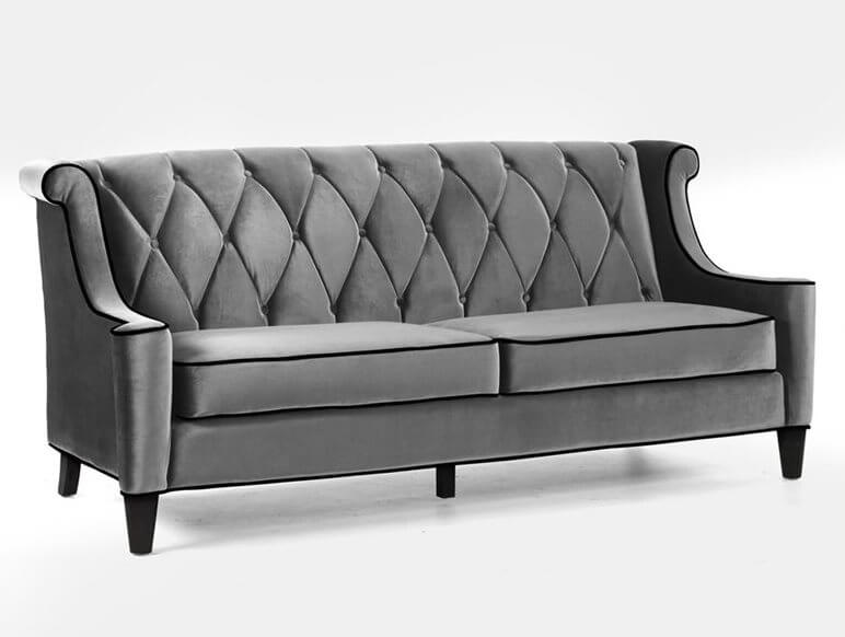 Grey velvet with black piping makes this deep-seated sofa something you'll want to cuddle up in at the end of a long day. The high tufted backrest adds additional comfort. Grey velvet with black piping makes this deep-seated sofa something you'll want to cuddle up in at the end of a long day. The high tufted backrest adds additional comfort.