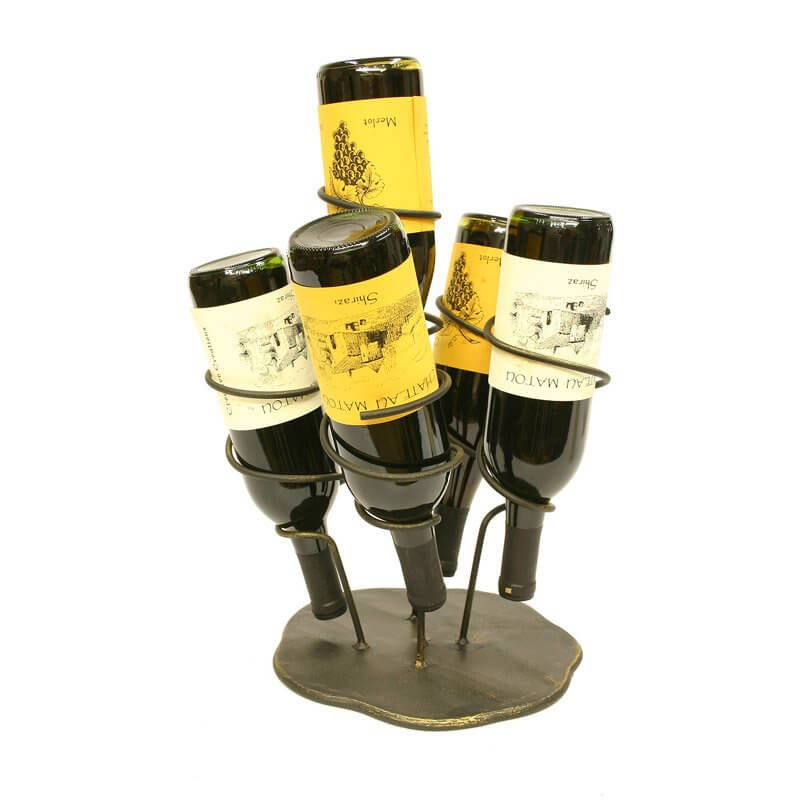The wine holder is usually a tabletop element meant for direct sharing of wine while having dinner with family or a gathering of friends. Perfect for tastings, they set the bottle in an artful, easy to access placement. The wine holder is usually a tabletop element meant for direct sharing of wine while having dinner with family or a gathering of friends. Perfect for tastings, they set the bottle in an artful, easy to access placement.