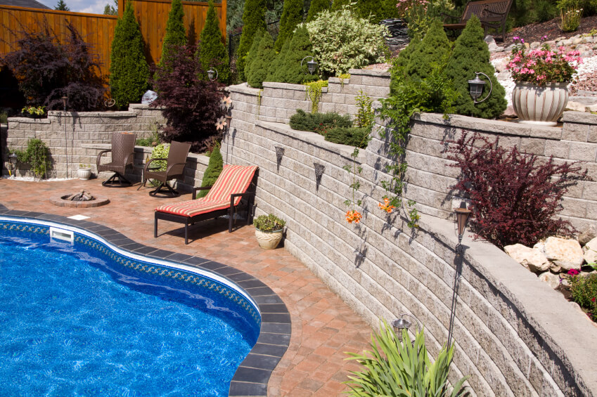 Terraces of multiple heights surround this pool complex, creating a private oasis. Terraces of multiple heights surround this pool complex, creating a private oasis.