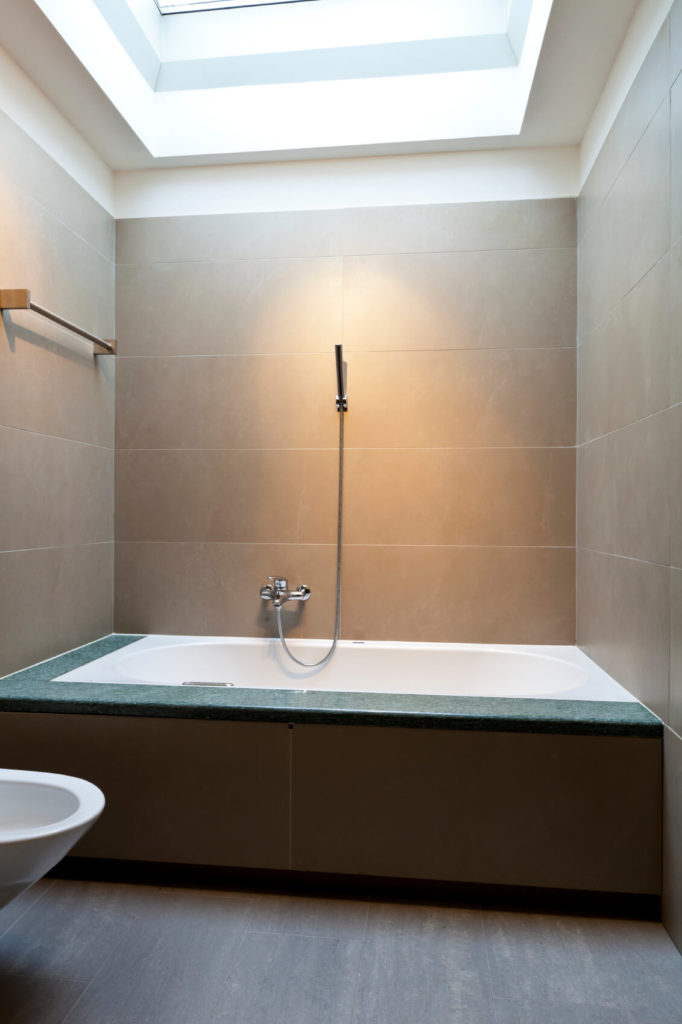 Another view of the previous bathroom highlights the stunning effects of the skylight. Another view of the previous bathroom highlights the stunning effects of the skylight.