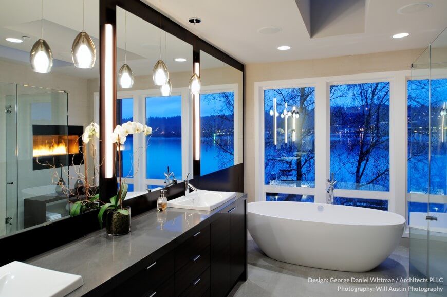 This charming bathroom has lots of windows for a fantastic and relaxing view. A fireplace built into the wall adds the perfect touch to make this room as peaceful as possible. This charming bathroom has lots of windows for a fantastic and relaxing view. A fireplace built into the wall adds the perfect touch to make this room as peaceful as possible.