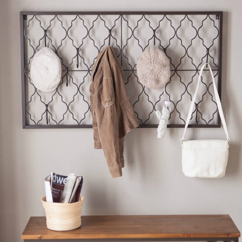 This hook solution doubles as a quaint piece of wall decor that would go wonderfully in a country or rustic-chic home. This hook solution doubles as a quaint piece of wall decor that would go wonderfully in a country or rustic-chic home.