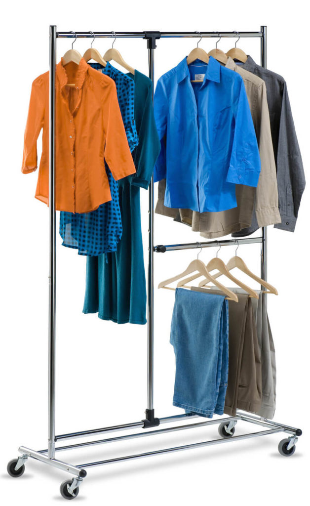 This rolling garment rack has two shorter racks for pants and shirts, along with a taller rack for dresses or other long garments. This rolling garment rack has two shorter racks for pants and shirts, along with a taller rack for dresses or other long garments.
