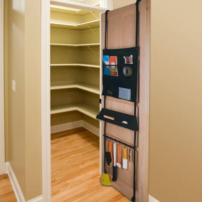This lengthy over-the-door organizer has tons of pockets and hooks for you to store your items in. This organizer is perfect for a linen closet or a closet you store cleaning supplies in. This lengthy over-the-door organizer has tons of pockets and hooks for you to store your items in. This organizer is perfect for a linen closet or a closet you store cleaning supplies in.