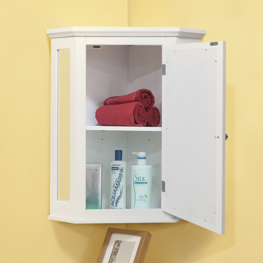 This corner-mounted cabinet has narrow mirrors on the side to add elegance. The deep, tall shelves ensure you will have space for whatever you may need to store. This corner-mounted cabinet has narrow mirrors on the side to add elegance. The deep, tall shelves ensure you will have space for whatever you may need to store.