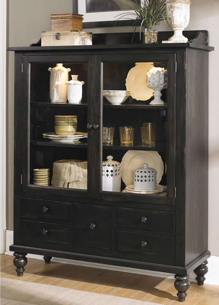 The lower drawers are perfect for storing silverware or linens, while more delicate pieces are arranged in on the shelves above. The lower drawers are perfect for storing silverware or linens, while more delicate pieces are arranged in on the shelves above.