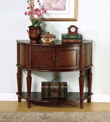 Two doors open to reveal the inside of the table with plenty of room to store your possessions. The lower shelf can be used for display, or for more storage Two doors open to reveal the inside of the table with plenty of room to store your possessions. The lower shelf can be used for display, or for more storage