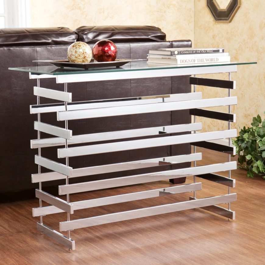 The criss-crossing metal bars, combined with the glass top, creates a spectacular modern effect that you'll love, regardless of the room the table ends up in The criss-crossing metal bars, combined with the glass top, creates a spectacular modern effect that you'll love, regardless of the room the table ends up in