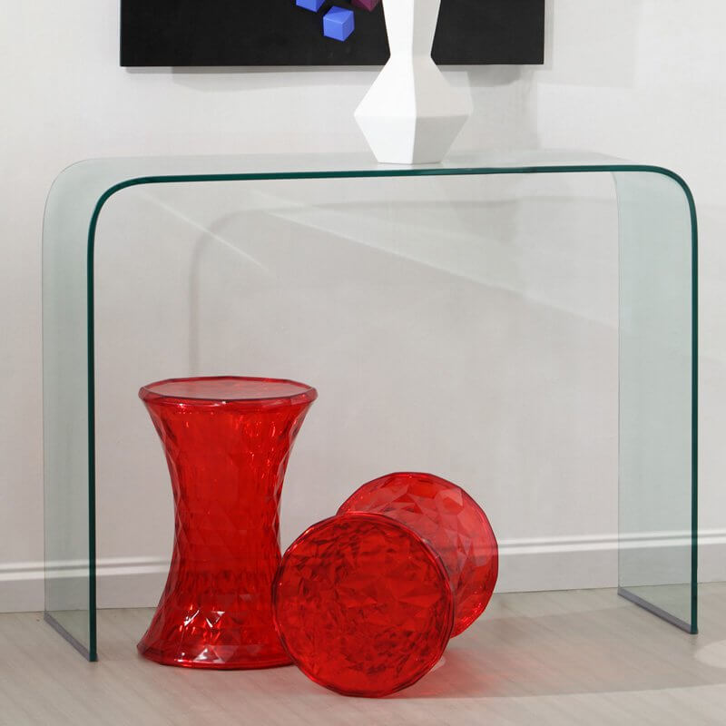 For an ultra-modern and minimalist design, look no further than this all-glass curved console table. For an ultra-modern and minimalist design, look no further than this all-glass curved console table.