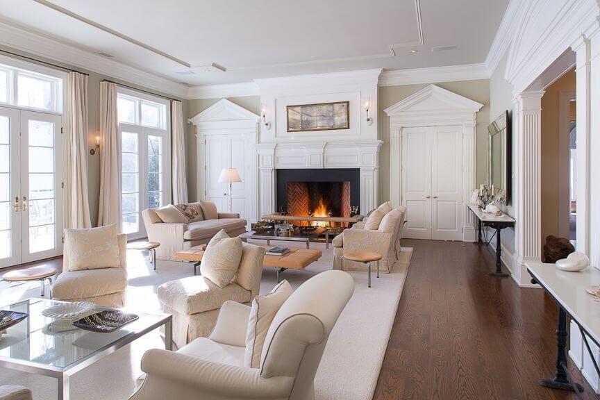 This room doesn't have the benefit of a separating arch to distinguish between the two seating areas, but the different arrangements and space between the two areas makes it clear that they are separate areas. This room doesn't have the benefit of a separating arch to distinguish between the two seating areas, but the different arrangements and space between the two areas makes it clear that they are separate areas.