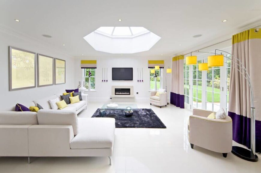 The accent colors are used a little more subtly in this living room, which features bright yellow at the top of the room and royal purple near the floor. The accent colors are used a little more subtly in this living room, which features bright yellow at the top of the room and royal purple near the floor.