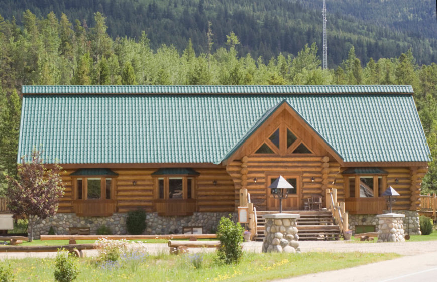 This split log style maintains the cabin feel of this mountain lodge. Split log siding is a striking by high maintenance exterior choice. This split log style maintains the cabin feel of this mountain lodge. Split log siding is a striking by high maintenance exterior choice.