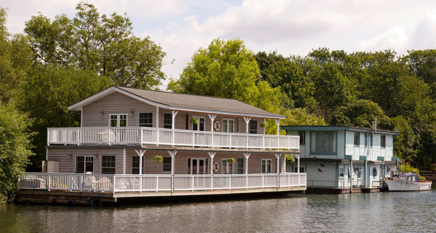 This is an incredibly massive houseboat that could be larger than many landlocked homes. Two wraparound porches frame the home. This is an incredibly massive houseboat that could be larger than many landlocked homes. Two wraparound porches frame the home.