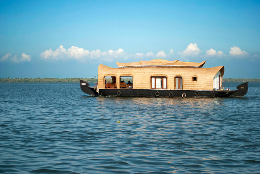 Another leisure barge from Kerala. The hull of these boats are wooden planks held together by coconut fibers, while roof are palm leaves supported by bamboo poles. Another leisure barge from Kerala. The hull of these boats are wooden planks held together by coconut fibers, while roof are palm leaves supported by bamboo poles.