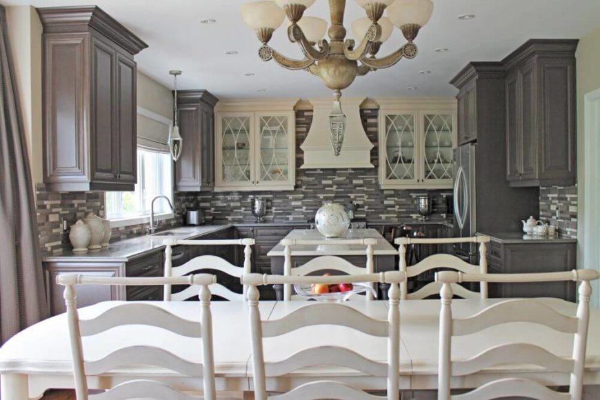 Florence inspired kitchen design. Florence inspired kitchen with a center island and a dine-in table set.