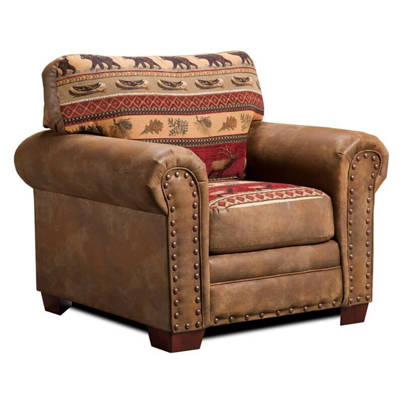Make your man cave feel like your own personal hunting lodge with this classic design, printed with iconic bear, canoe, leaf, and moose pattern. With nail head trim and faux-leather upholstery, this chair sits wonderfully among other rustic-themed furniture, and with its hardy construction of a solid wood frame and fiber-wrapped cushions, it's a chair that can withstand living in a man cave. Make your man cave feel like your own personal hunting lodge with this classic design, printed with iconic bear, canoe, leaf, and moose pattern. With nail head trim and faux-leather upholstery, this chair sits wonderfully among other rustic-themed furniture, and with its hardy construction of a solid wood frame and fiber-wrapped cushions, it's a chair that can withstand living in a man cave.