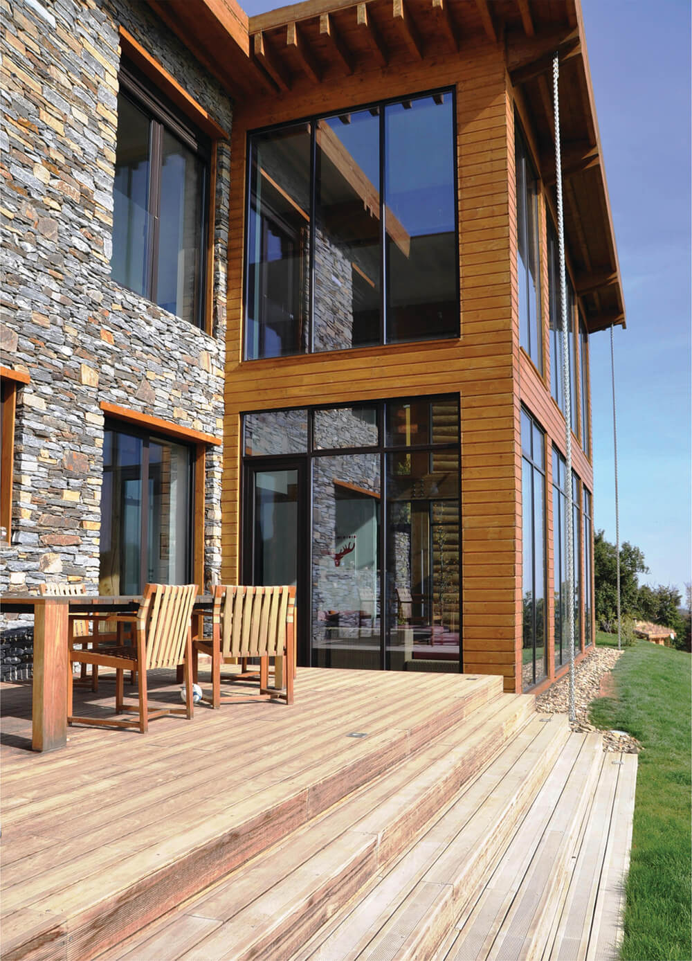 This deck offers a dining table set for additional dining options.