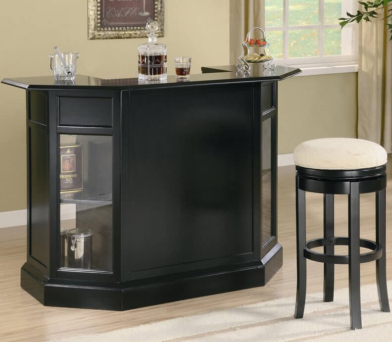If you've got a more contemporary styled man cave, you might want to check this bar out. The sleek black construction boasts a glossy bar top and half-octagon design that helps it really stand out in any space. The glass shelf windows add an extra layer of luxury and make for a unique storage solution.