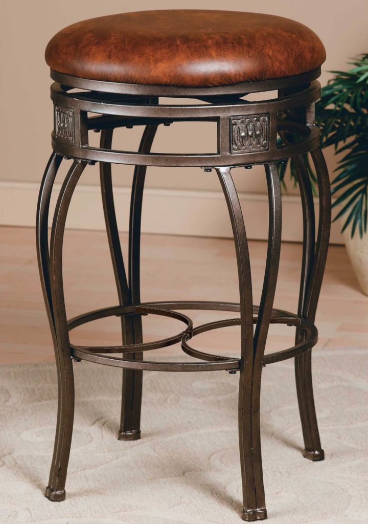 We adore the old steel look of this rather ornate, backless bar stool. The rich, warm toned leather upholstery rides atop an ornate frame for a combination of strong textures and tones. This stool would fit perfectly in any elegant, luxury-oriented man cave. If your room is a place where rich wood and fireplaces appear, a stool like this could be the key to completing the look.