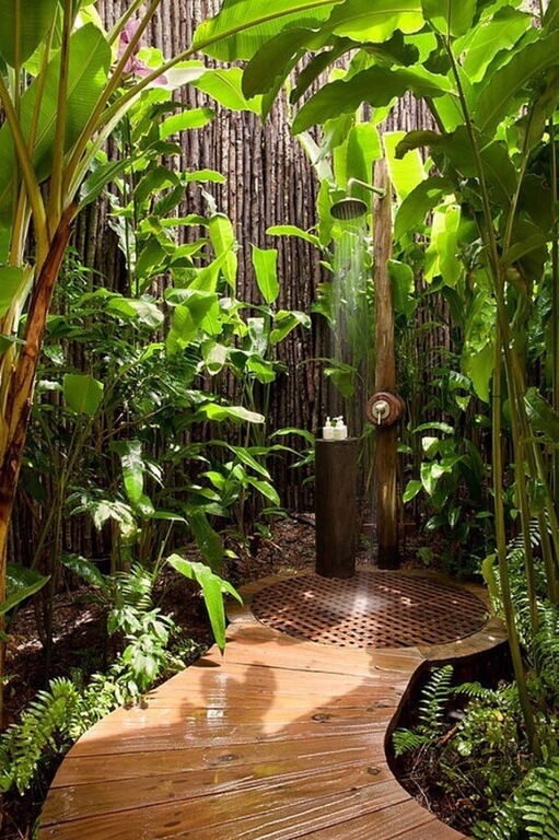 A tall, contiguous bamboo privacy fence screens in this beautiful, secluded outdoor shower. The lush landscaping adds additional privacy from any possible prying eyes. A tall, contiguous bamboo privacy fence screens in this beautiful, secluded outdoor shower. The lush landscaping adds additional privacy from any possible prying eyes.