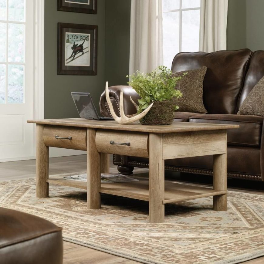 While Craftsman style often leans slightly toward rustic minimalism, this table is probably the furthest in that direction we've yet seen. Curved wood pieces make for a warmly natural look, as does the light unvarnished tone. The coffee table fits two drawers in for abundant storage, plus a lower level surface for additional display space. While Craftsman style often leans slightly toward rustic minimalism, this table is probably the furthest in that direction we've yet seen. Curved wood pieces make for a warmly natural look, as does the light unvarnished tone. The coffee table fits two drawers in for abundant storage, plus a lower level surface for additional display space.