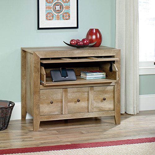 Similar to the above bookshelf, this svelte and squat piece of furniture is another grand example of Craftsman style in a compact, unassuming form. The light natural wood tone lends itself to rustic spaces, or as a counterpoint to more modern rooms. The Craftsman design allows for unique and useful features like the lift-and-hide panel that reveals a pull-out surface. Similar to the above bookshelf, this svelte and squat piece of furniture is another grand example of Craftsman style in a compact, unassuming form. The light natural wood tone lends itself to rustic spaces, or as a counterpoint to more modern rooms. The Craftsman design allows for unique and useful features like the lift-and-hide panel that reveals a pull-out surface.