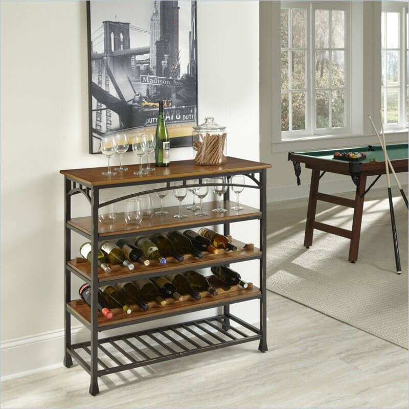While it looks at first glance very similar to a couple of our shelving units pictured above, this attractive little piece of furniture is in fact a Craftsman style wine rack designed to sit in your living room. It's got layers of rich oak shelving for both glasses and bottles, and is adorned with the familiar slim arch and vertical slats in its powder coated metal framing. While it looks at first glance very similar to a couple of our shelving units pictured above, this attractive little piece of furniture is in fact a Craftsman style wine rack designed to sit in your living room. It's got layers of rich oak shelving for both glasses and bottles, and is adorned with the familiar slim arch and vertical slats in its powder coated metal framing.