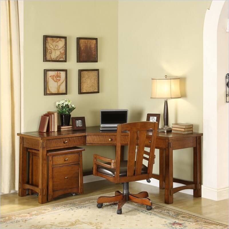 Unlike the previous two Craftsman desks we've featured, this model is a little more elaborate, perhaps meant to dominate a smaller home office space than take up the corner of your large open living room. Still, given a properly sized room, this can make for the perfect addition, with its rich all-wood construction and relatively sleek design. The corner shaped desk features an accompanying dresser-like component on casters for easy access. Unlike the previous two Craftsman desks we've featured, this model is a little more elaborate, perhaps meant to dominate a smaller home office space than take up the corner of your large open living room. Still, given a properly sized room, this can make for the perfect addition, with its rich all-wood construction and relatively sleek design. The corner shaped desk features an accompanying dresser-like component on casters for easy access.