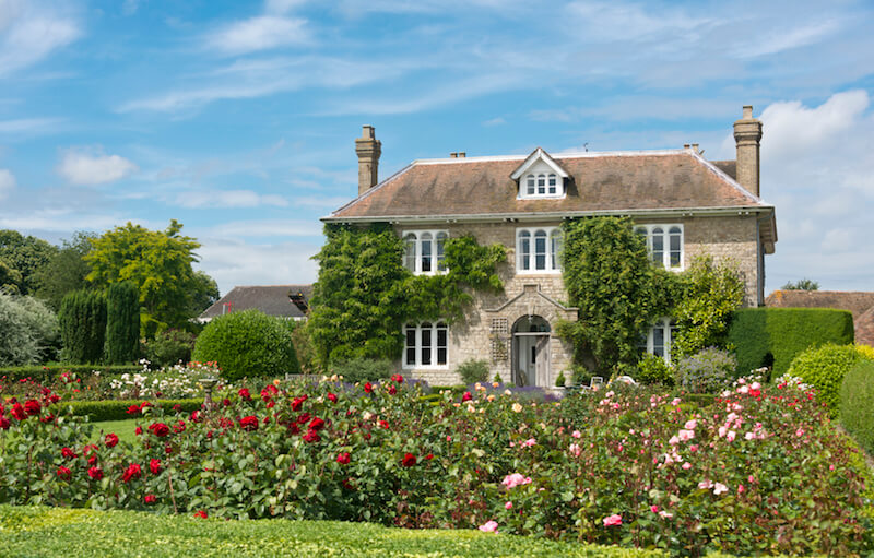 This country estate is filled with slightly overgrown rose bushes, creating a magical and beautiful display. This country estate is filled with slightly overgrown rose bushes, creating a magical and beautiful display.