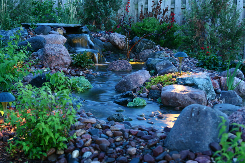 A more expansive pond complete with a waterfall and plenty of water-loving plant life. A more expansive pond complete with a waterfall and plenty of water-loving plant life.