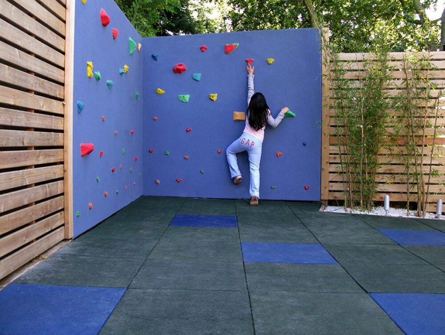 Or, install an awesome climbing wall for the kids to play on. Just don't build it too tall. Or, install an awesome climbing wall for the kids to play on. Just don't build it too tall.
