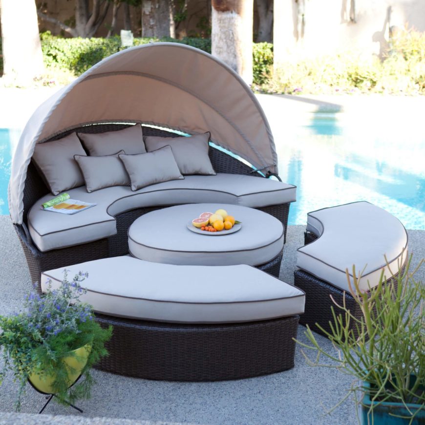 This incredible poolside set can be pushed together to form a lounge bed, or pushed apart to form a coffee table and three bench seats, one of which has a shade This incredible poolside set can be pushed together to form a lounge bed, or pushed apart to form a coffee table and three bench seats, one of which has a shade