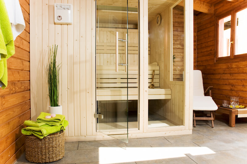 The sauna building opens up into a small bathroom area, with the actual sauna booth in the corner. The sauna building opens up into a small bathroom area, with the actual sauna booth in the corner.